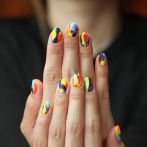woman's nails with manicure